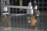 Эластичные напольные покрытия - Тестовый аппарат для определения эффекта колесика кресла