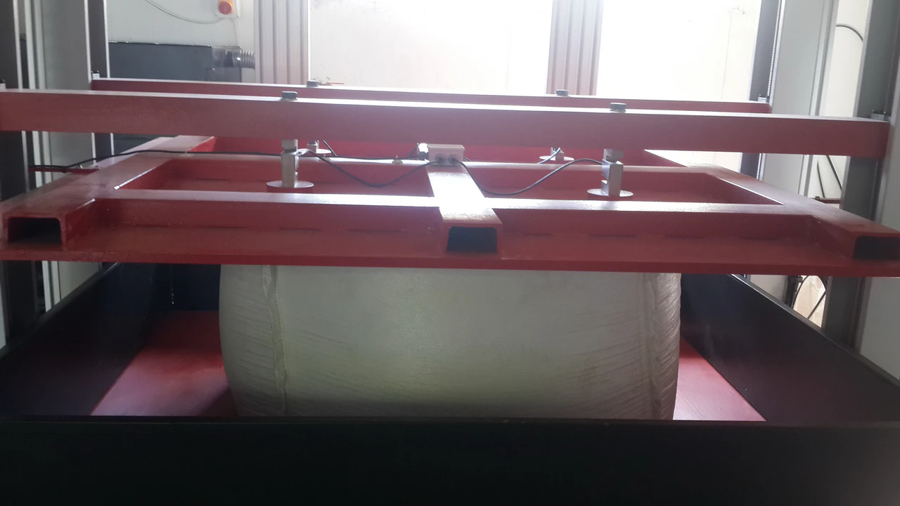 Dispositivo sperimentale di compressione/impilazione