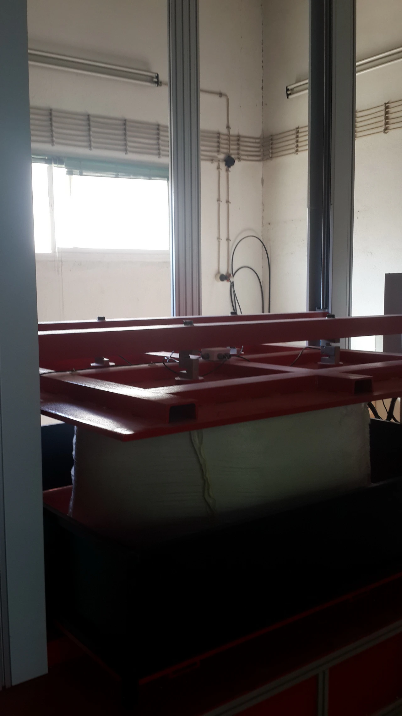 Dispositivo sperimentale di compressione/impilazione